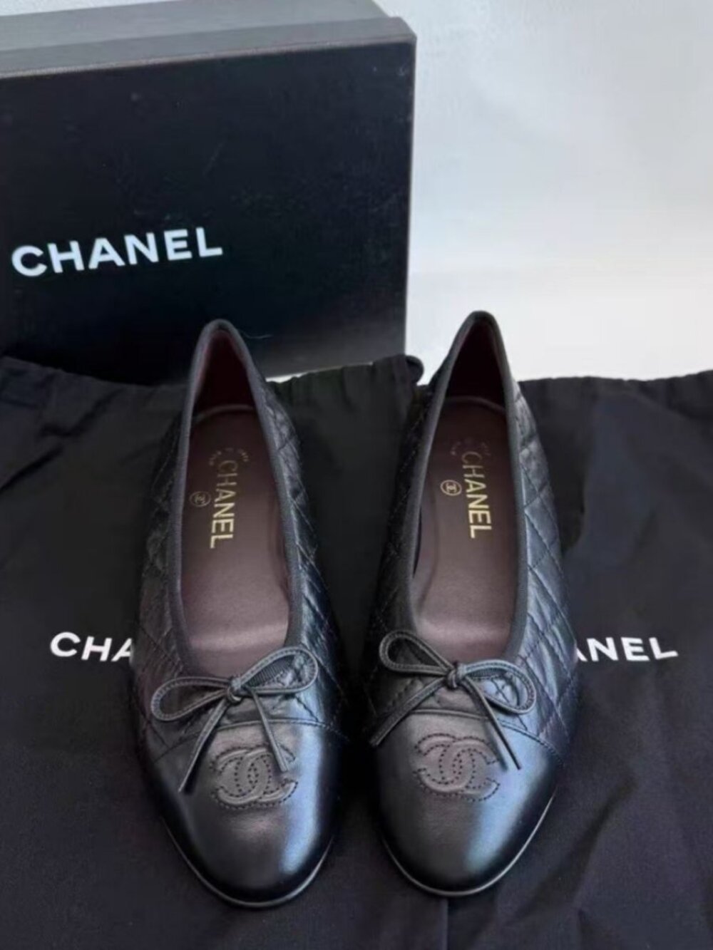 CHANEL black quilted lambskin ballet flats